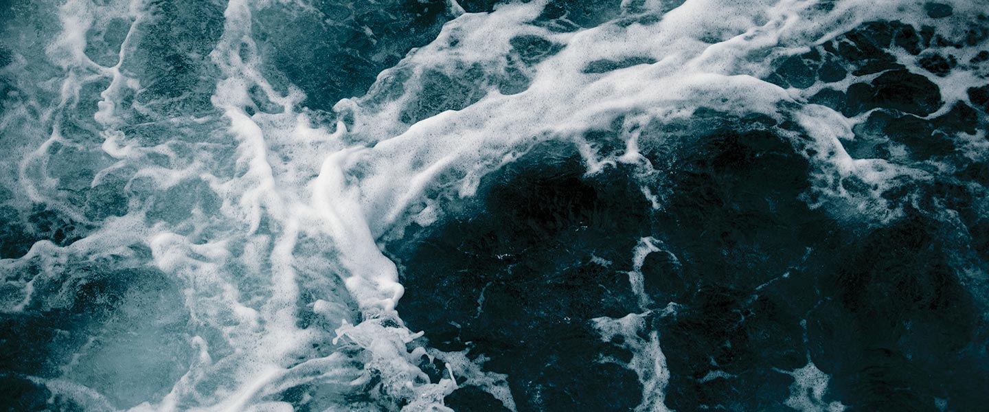 Swirling and crashing ocean waves.